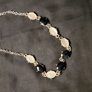 WHBM gold with black and white stones